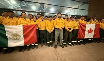 Regresan a México 205 combatientes de incendios tras misión en Canadá